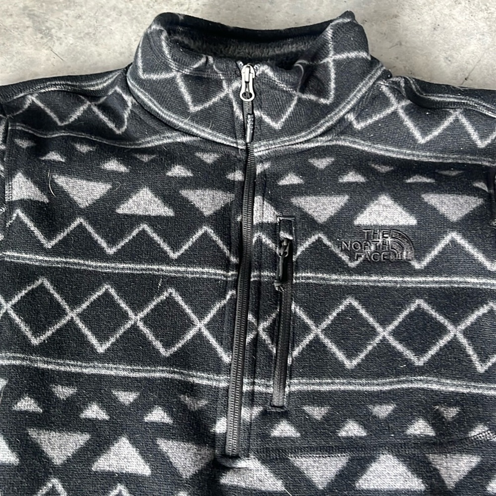 North Face Half-Zip. Black with gray pattern. Men’s Medium. Great condition.